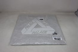 An as new Palace Sofar T-shirt (XL).