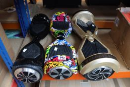 Three pre-owned hoverboards to include a SWAGTRON T5-U and a WINDGOO N1 (Bags and chargers not