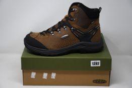 A pair of as new Keen Wild Sky Mid boots (UK 12).