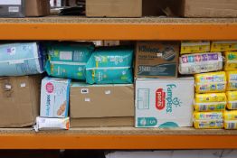 A quantity of assorted hygiene wipes, nappies, Tena pads and related items (Approximately 50