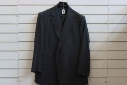 An as new Malcolm Plews (By Appointment TO HRH The Prince of Wales) Bespoke Military Tailor three-