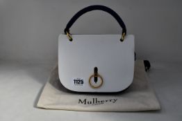 An as new Mulberry Vintage Cro Embossed Amberley patent leather satchel with dust bag.