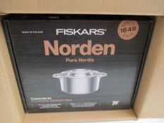 A boxed as new Fiskars Norden pure Nordic 5l stainless steel casserole dish.
