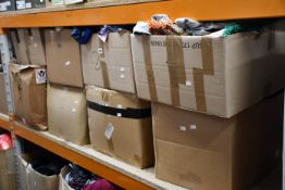 Eight boxes of assorted clothing and related items.