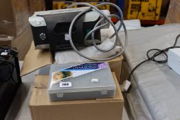 A commercial Ecleris Minivac Crystal-Free diamond tip microdermabrasion machine with accessories.