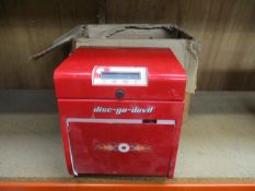 A pre-owned Disc-Go-Devil disc cleaning machine (Some damage visible).