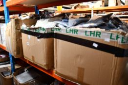 Three boxes of assorted clothing and related items.