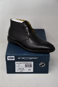 A pair of as new Steptronic Mitcham boots (EU 43).