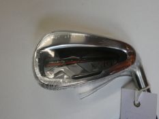 An as new DST XX10 golf club (9 iron).