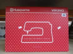 A boxed as new Husqvarna Viking Emerald 116 sewing machine.