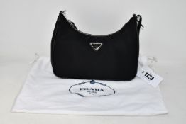An as new Prada re-edition 2005 nylon mini bag with dust bag.