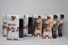 Three packs of as new Hugo Boss crew neck T-shirts (3 per pack, all L) and three packs of Hugo