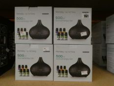 Nine boxed as new Homasy 500ml aromatherapy sets to include essential oils and diffusers.