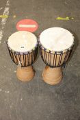 Two pre-owned single drum bongos.