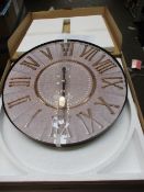 Three wall clocks to include vintage and floral shaped clock.