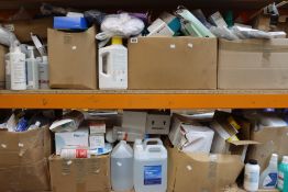 Two shelves of assorted medical and related items to include gloves, hand sanitiser and soap.