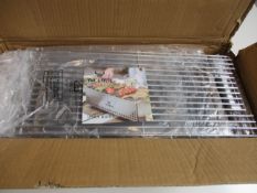 A boxed Yak Grills S400 charcoal hibachi grill.