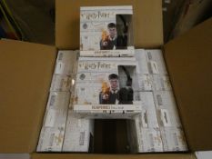 Twelve boxed as new Harry Potter Headphones.