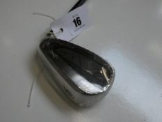 An as new DST XX10 golf club (6 iron).