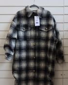 An as new Ducie London Abi lined coat in black/grey (One size - RRP £295).