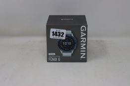An as new sealed Garmin Pro Solar Fenix 6 premium multisport GPS watch mineral blue with