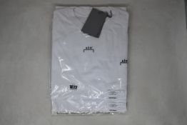 Two as new A.C.W. Essential T-shirts in white (L, XL - RRP £95 each).