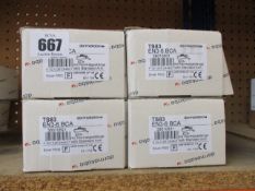 Four boxed Dormakaba TS83 Size 3-6 overhead door closers.