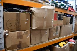 Eight boxes of assorted clothing and related items.