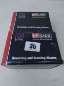 Two boxed as new Brigade reversing and warning alarms for vehicles.
