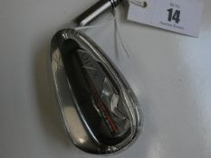 An as new DST XX10 golf club (P iron).