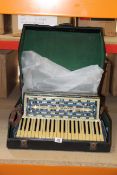 A pre-owned Scandalli Vibrente Three accordion with mother of pearl inlays, with case.
