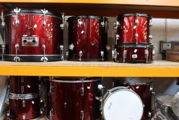 A pre-owned drum kit to include Stagg and Remo with another mini drum kit.