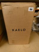 A boxed Kaelo integrated wine cooler in brushed black.