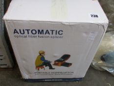 A boxed AI-9 Optical Fiber Fusion Splicer.