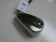 An as new DST XX10 golf club (7 iron).