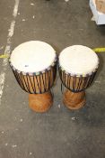 Two pre-owned single drum bongos.