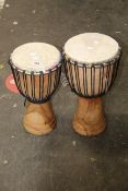 Two pre-owned single drum bongos.