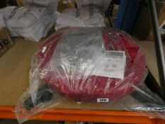 A Balsam Hill Pro Upright Christmas Tree Bag with rolling stand.