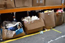 Eight boxes of assorted clothing and related items.