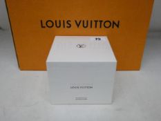 A boxed as new Louis Vuitton Du Jardin Bougie parfumed candle (220g).