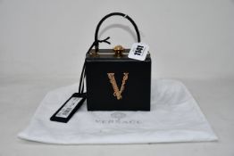 An as new Versace Virtus square handbag (RRP £1,770).