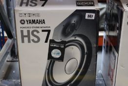 A boxed Yamaha HS7 Powered Studio Monitor.
