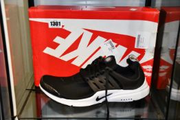 A pair of as new Nike Air Presto trainers (UK10).