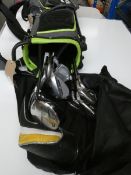 A TaylorMade golf bag containing thirteen assorted clubs (King Cobra SZ, TaylorMade M2, Dunlop Max