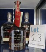 Two bottles of Woodford Reserve Kentucky straight bourbon whiskey (700ml), together with a bottle of