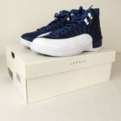 A boxed as new Nike Air Jordan 12 Retro Size 6 (UK), stone blue / legend blue