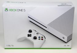 A boxed as new Microsoft Xbox One S 1TB with Controller in White (UK/Ireland version M/N: 1681
