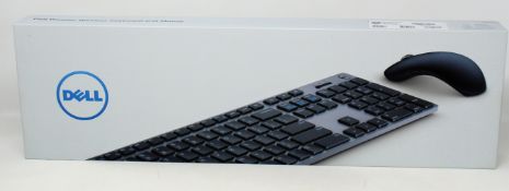 A boxed as new Dell Premier Wireless Keyboard and Mouse (P/N: 0NJWTK VPN:KM717-GY-UK) (Box sealed).