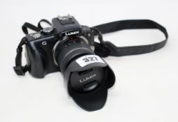 A pre-owned Panasonic LUMIX DMC-G3 16MP Micro Four-Thirds Camera with Panasonic Lumix G Vario 14-