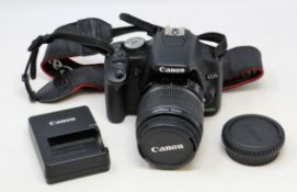 A pre-owned Canon EOS 500D DSLR Camera with EF-S 18-55mm IS Lens, Battery, Charging Dock and Samsung